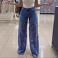 Jeans i patchwork-design med blonder