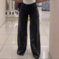 Jeans i patchwork-design med blonder